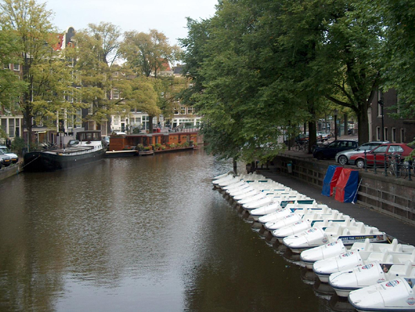 Tourist Boats on an Amsterdam Canal, Netherlands Photo